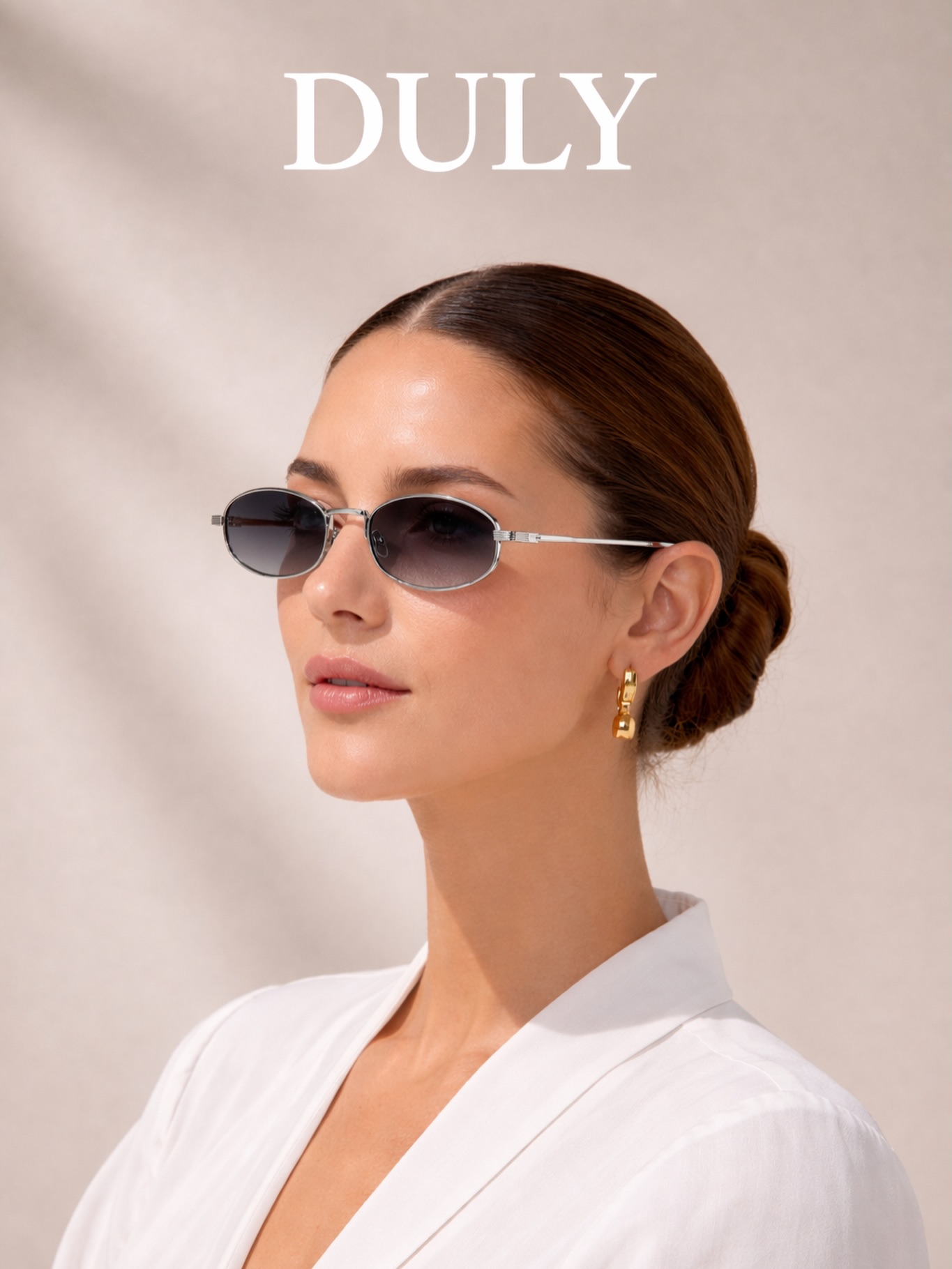 DULY silver oval sunglasses on model