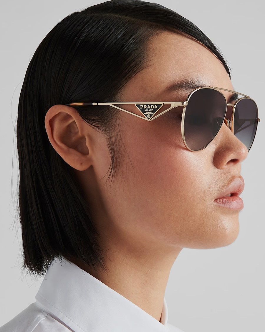 Profile portrait in pale-gold aviator