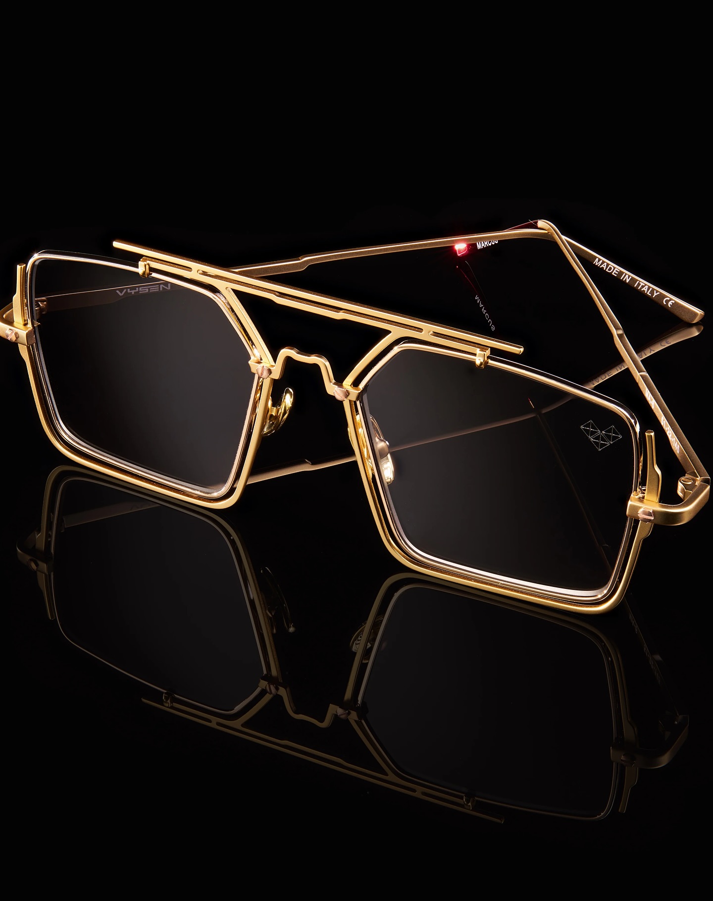 Gold geometric frame in dark reflection